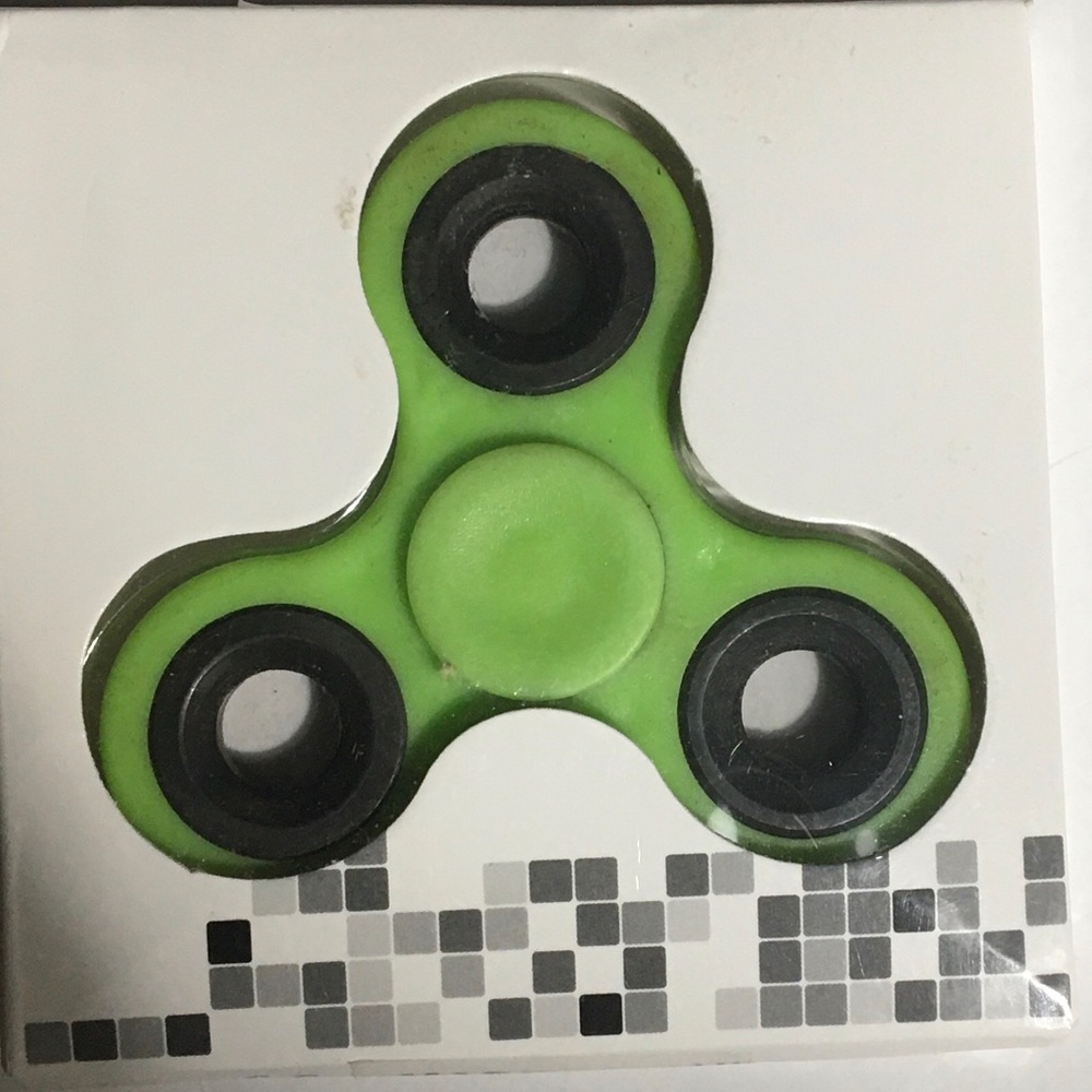 Item# 302. New green fidget spinner